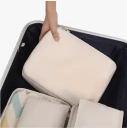 emballer des cubes dans une valise