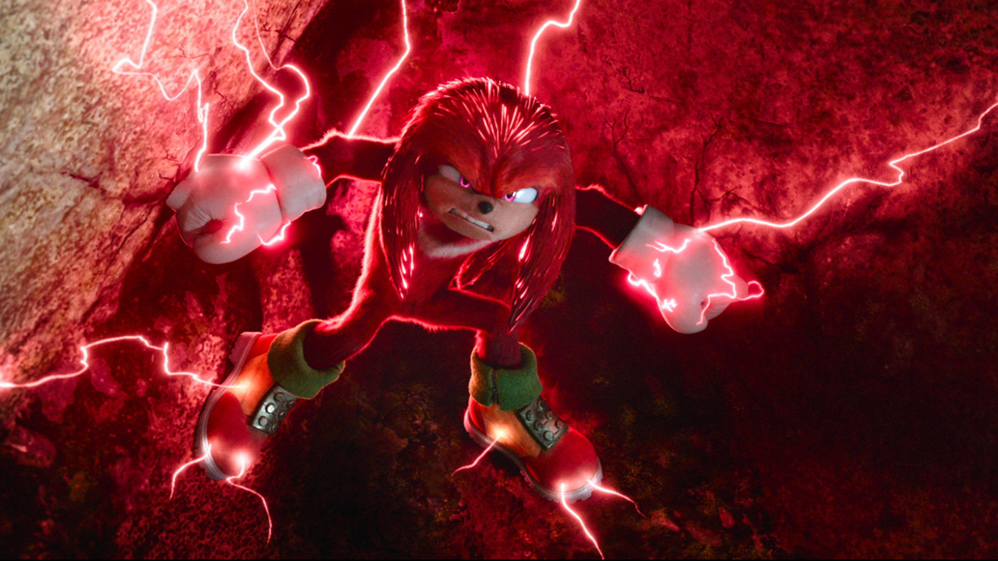 Le personnage de jeu vidéo Knuckles le hérisson brille d'électricité rouge.