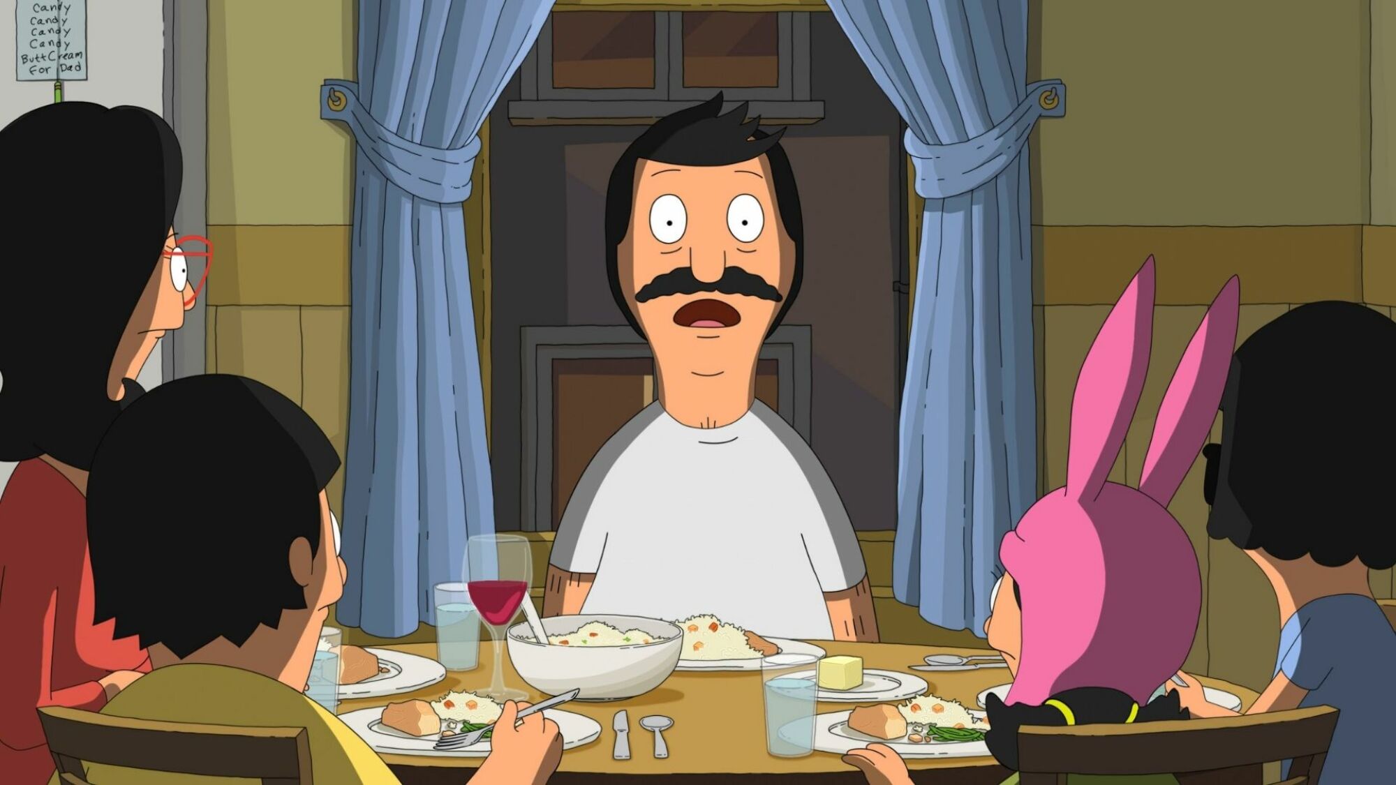 La famille Belcher à la table de la cuisine