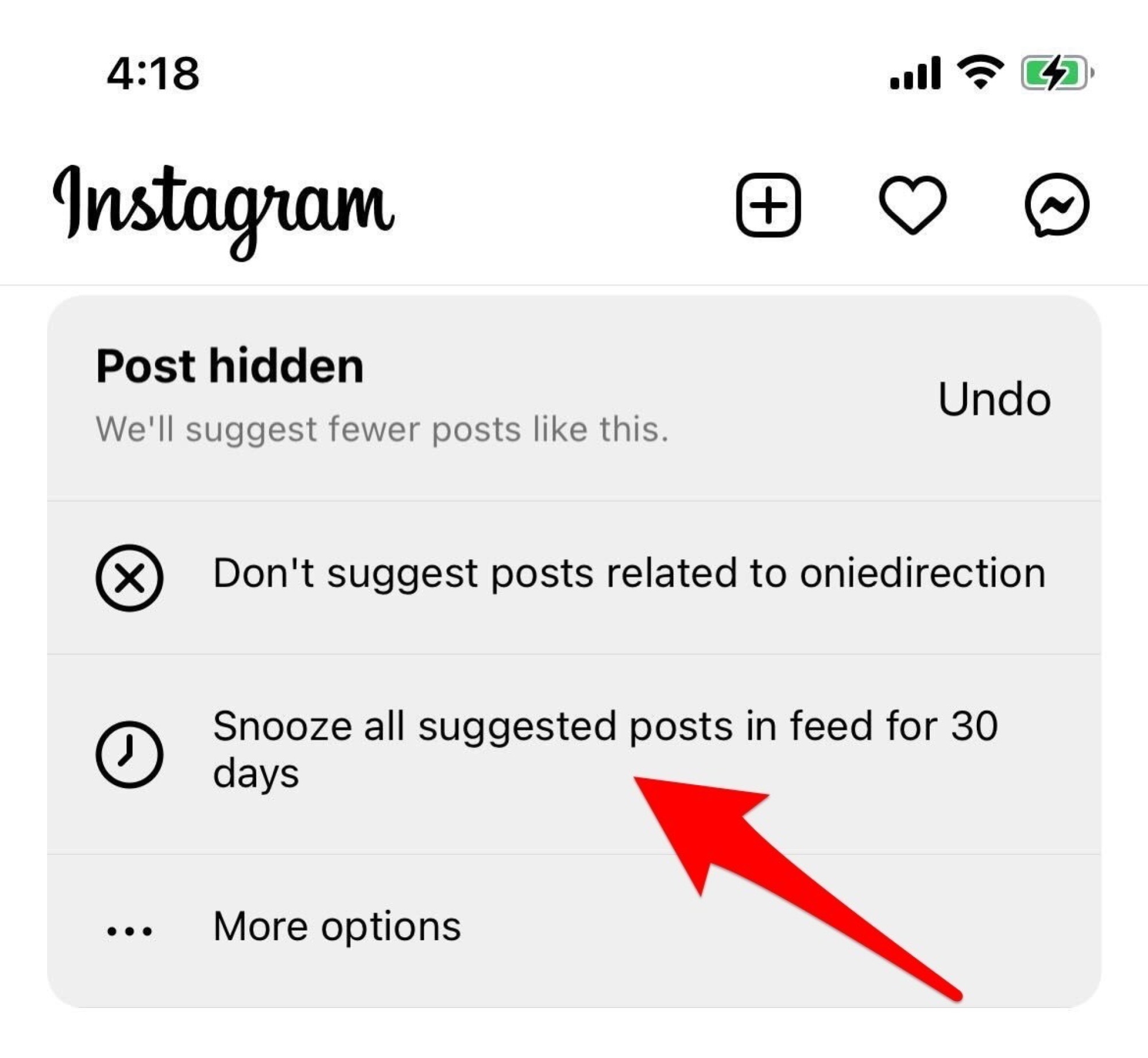 capture d'écran instagram flèche rouge pointant vers l'option masquer la publication dans le flux pendant 30 jours