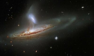 Une photo extrême de Hubble montre une galaxie déchirant les systèmes solaires d'une autre galaxie