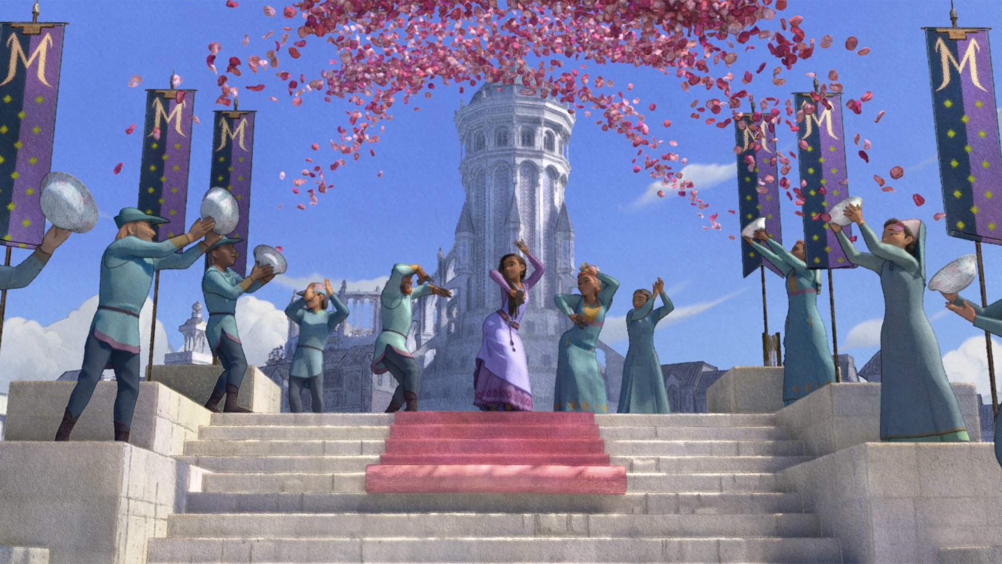 Un groupe de citadins jette des pétales de roses sur des danseurs devant un château.