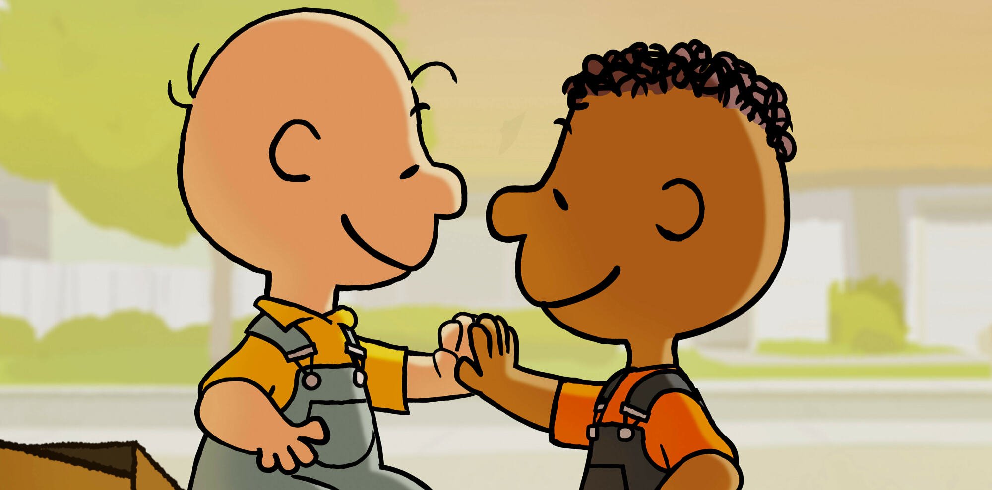 Charlie Brown et Franklin se félicitent mutuellement. 