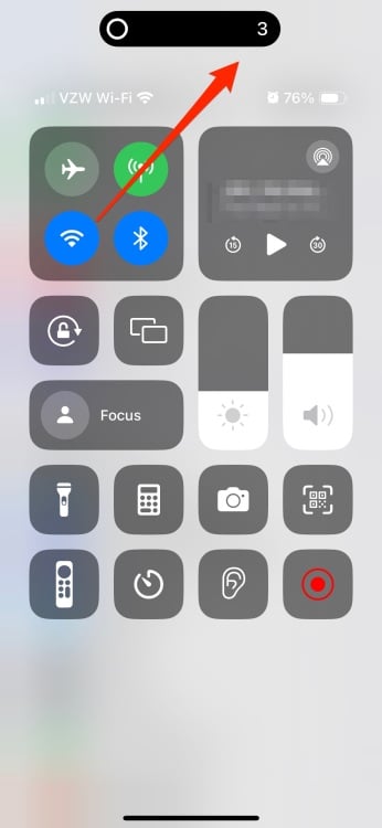 Centre de contrôle de l'iPhone affichant le bouton d'enregistrement activé et un compte à rebours jusqu'au début de l'enregistrement.