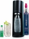 Machine à SodaStream Terra avec CO2, verre d'eau pétillante et gouttes pétillantes