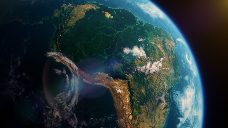 Un rendu numérique de l'Amérique du Sud depuis l'espace montrant les systèmes nuageux tourbillonnants et la courbure de la planète