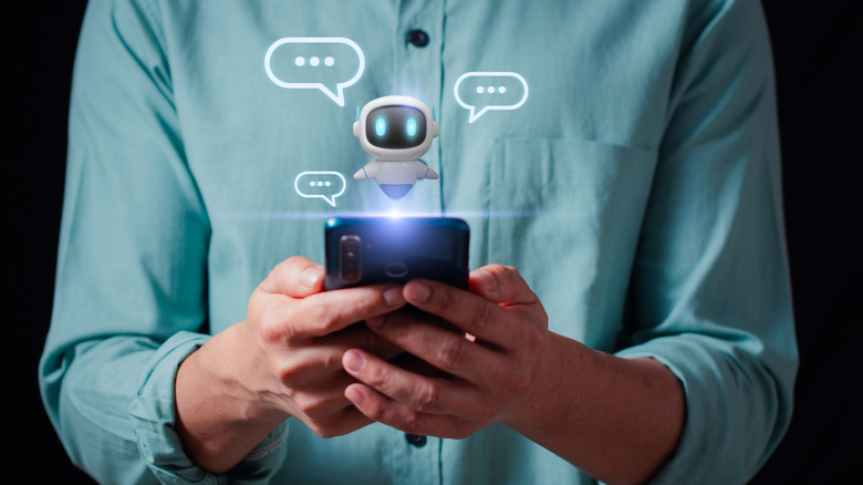 Un homme envoie des SMS avec un programme d'IA