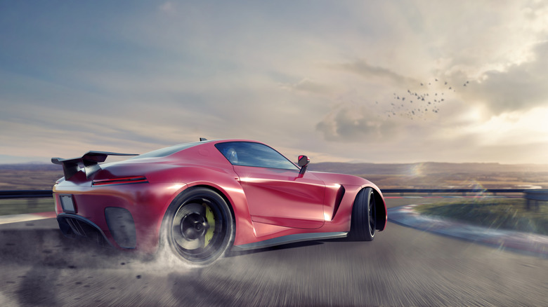 Un rendu d'une voiture de sport dérivant autour d'un tour