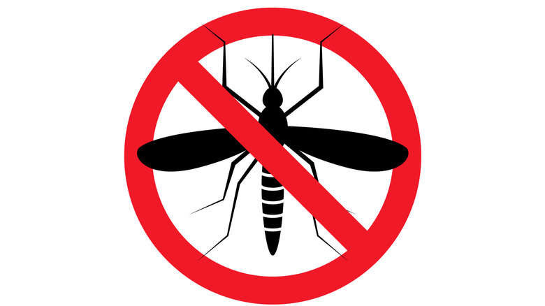 Un panneau anti-malaria déclarant 