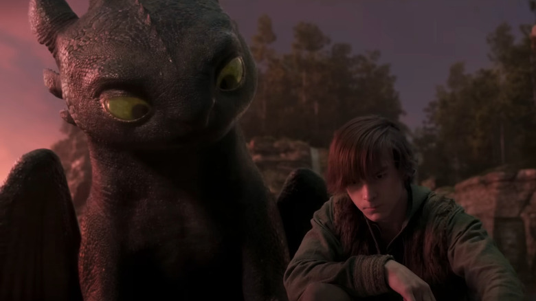 Hiccup (Mason Thames) s'inspire du sable alors que Hiccup regarde dans How to Train Your Dragon (2025)