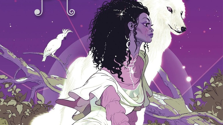 L'hiver se dresse à côté d'un loup blanc géant dans les chroniques lunaires