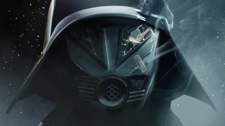 Un casque sombre endommagé est encadré contre les étoiles dans la suite des boules spatiales