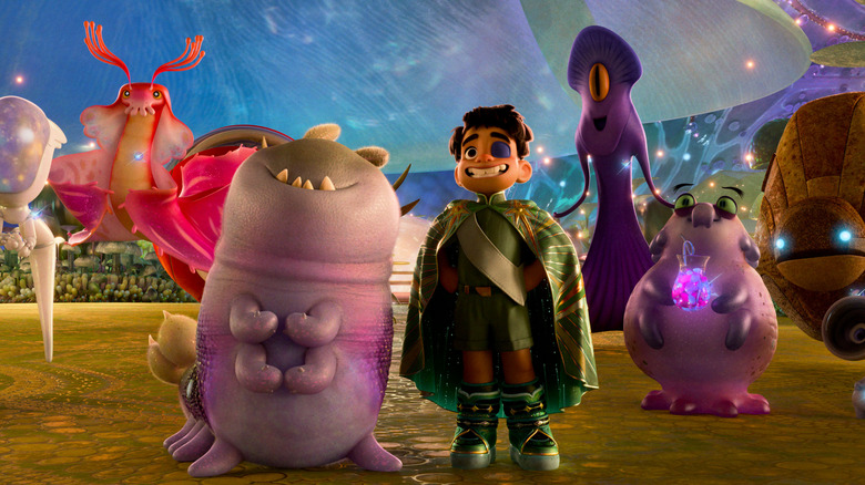 Yonas Kibreab comme la voix d'Elio debout à côté des extraterrestres Glordon (Remy edgerly), Tegman (Matthias Schweighöfer), Helix (Brandon Moon), Turais (Ana de la Reguera) et Questa (Jameela Jamil) à Elio