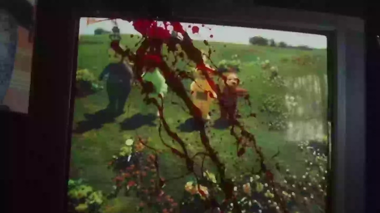 Des éclaboussures de sang sur une télévision montrant les télétubbies