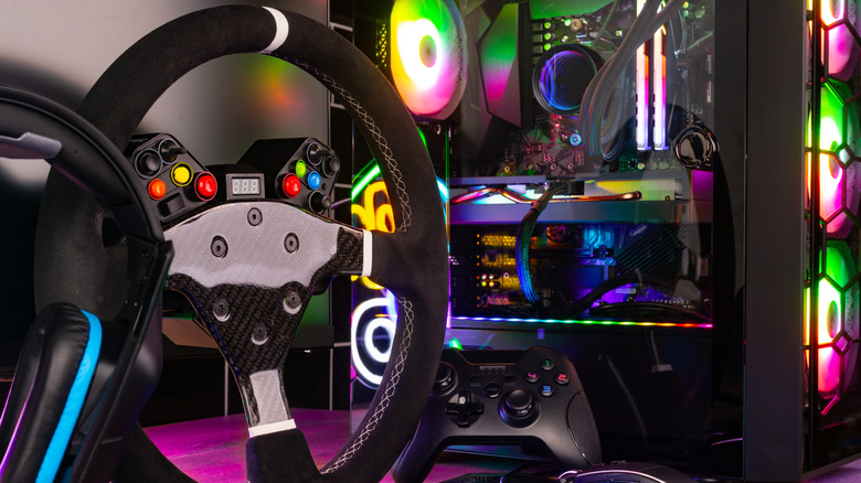 CPU de couleur RVB avec une roue de course et un contrôleur qui ont des boutons de couleur différents incrustés.