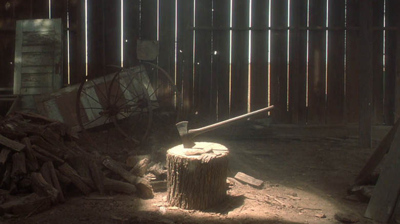 La hache magique se trouve sur une souche de fragilité