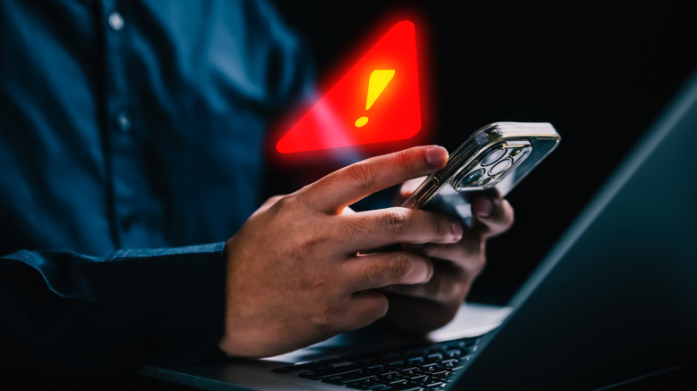 Panneau d'avertissement sur le smartphone