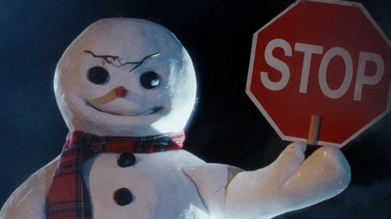 Jack Frost tenant un panneau d'arrêt à Jack Frost
