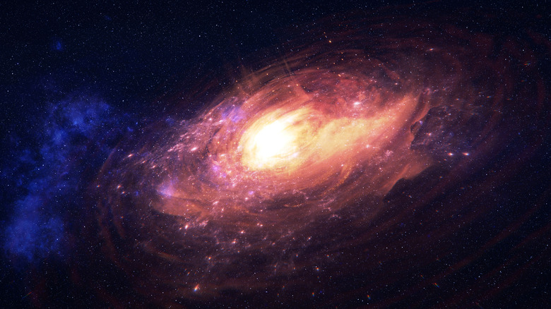 Un quasar orange est vu dans l'espace