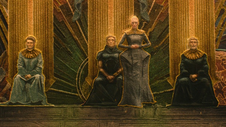 Une murale représentant Demerzel debout à côté des trois Cléons de la Fondation