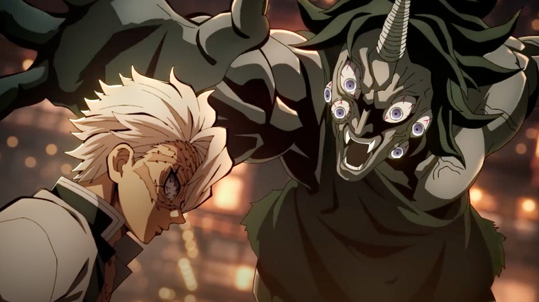 Un démon avec de nombreux yeux sur l'attaque dans Demon Slayer: Kimetsu no Yaiba - Infinity Castle