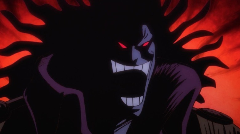 Une silhouette de Rocks D. Xebec riant dans One Piece