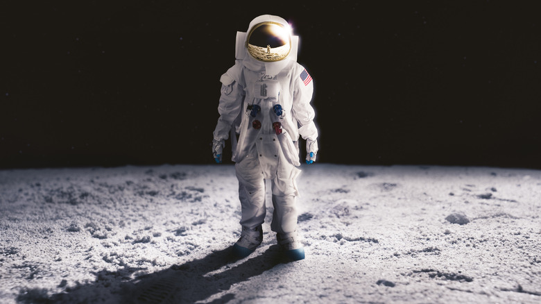 illustration d'un astronaute debout sur la lune