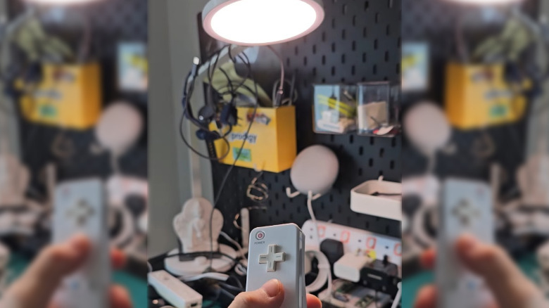 Une télécommande Wii utilisée pour allumer et éteindre une lumière.