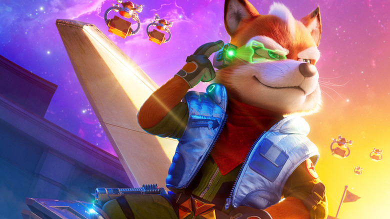 Star Fox portant sa visière et posant sur une affiche du film Super Mario Galaxy