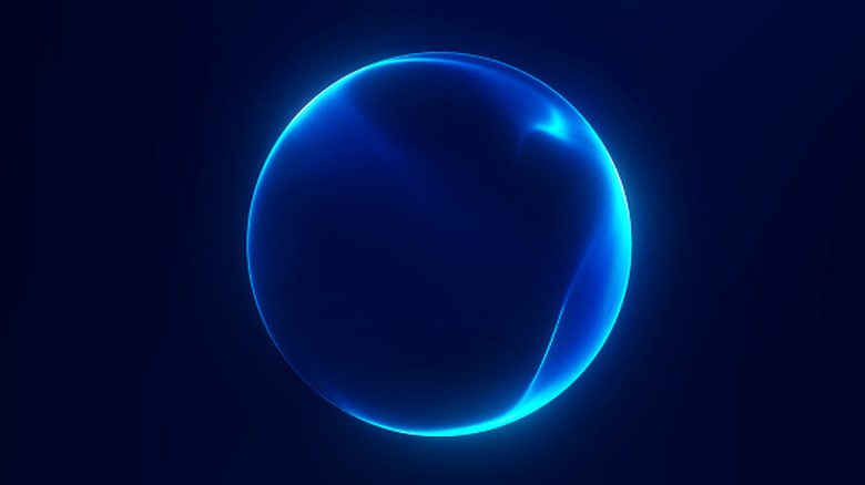 Un orbe de lumière bleue représentant une particule fondamentale