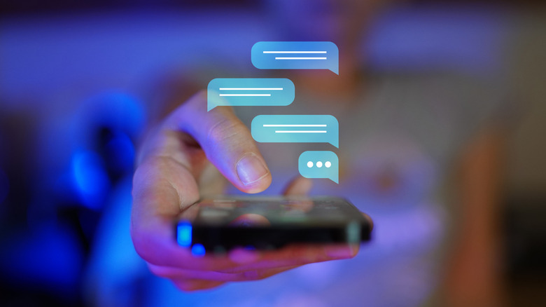 Illustration montrant les icônes de message texte au-dessus d'un iPhone