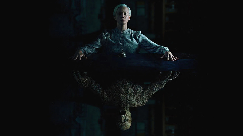 Affiche Oddity de Darcy Odello et d'un golem en bois