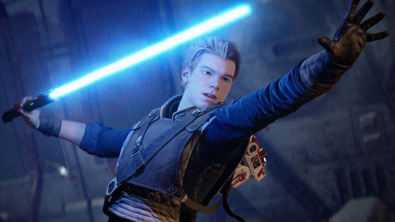 Cal Kestis avec son sabre laser bleu dans une main dans Star Wars Jedi : Fallen Order