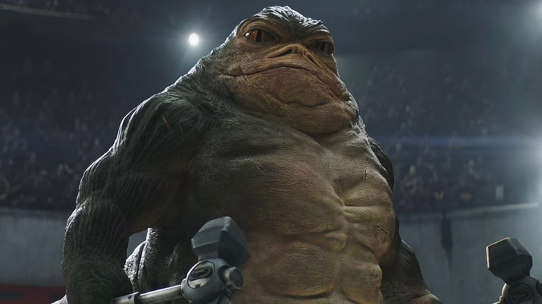 Rotta le Hutt tenant des haches dans une arène de combat dans The Mandalorian et Grogu
