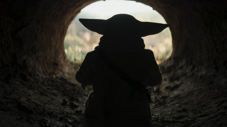 Grogu sortant de sa hutte de terre dans The Mandalorian et Grogu