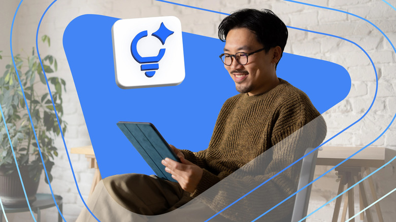 Un homme lisant sur une tablette, une ampoule bleue dessinée à côté de lui.
