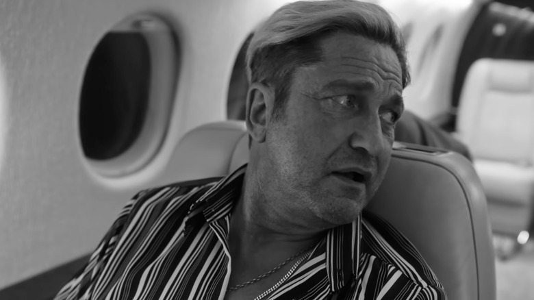 Gerard Butler arbore un travail de teinture blonde dans le rôle de Louie dans Dans la main de Dante