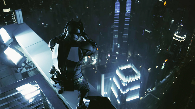 Le Batman de Christian Bale se tient au sommet d'un gratte-ciel de Hong Kong dans The Dark Knight
