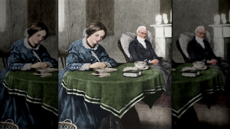Portrait de Charlotte Brontë écrivant sur des papiers à une table