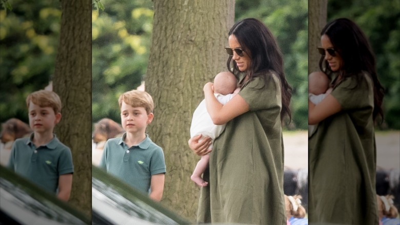 Meghan Markle tient le prince Archie dans ses bras en portant des lunettes de soleil